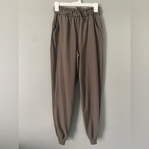 Lululemon Stretch High Rise Jogger Pants 27in inseam Olive Green Women's Size 4